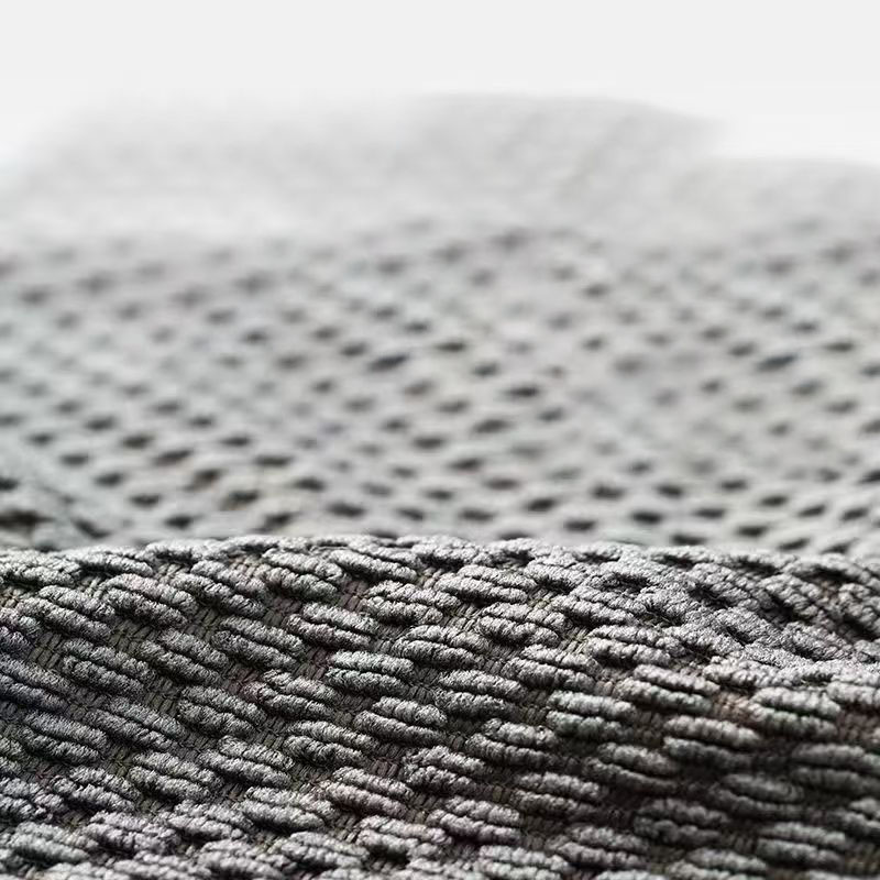 Jacquard weave cleaning cloth texture A close-up of a jacquard weave cleaning cloth showing its texture