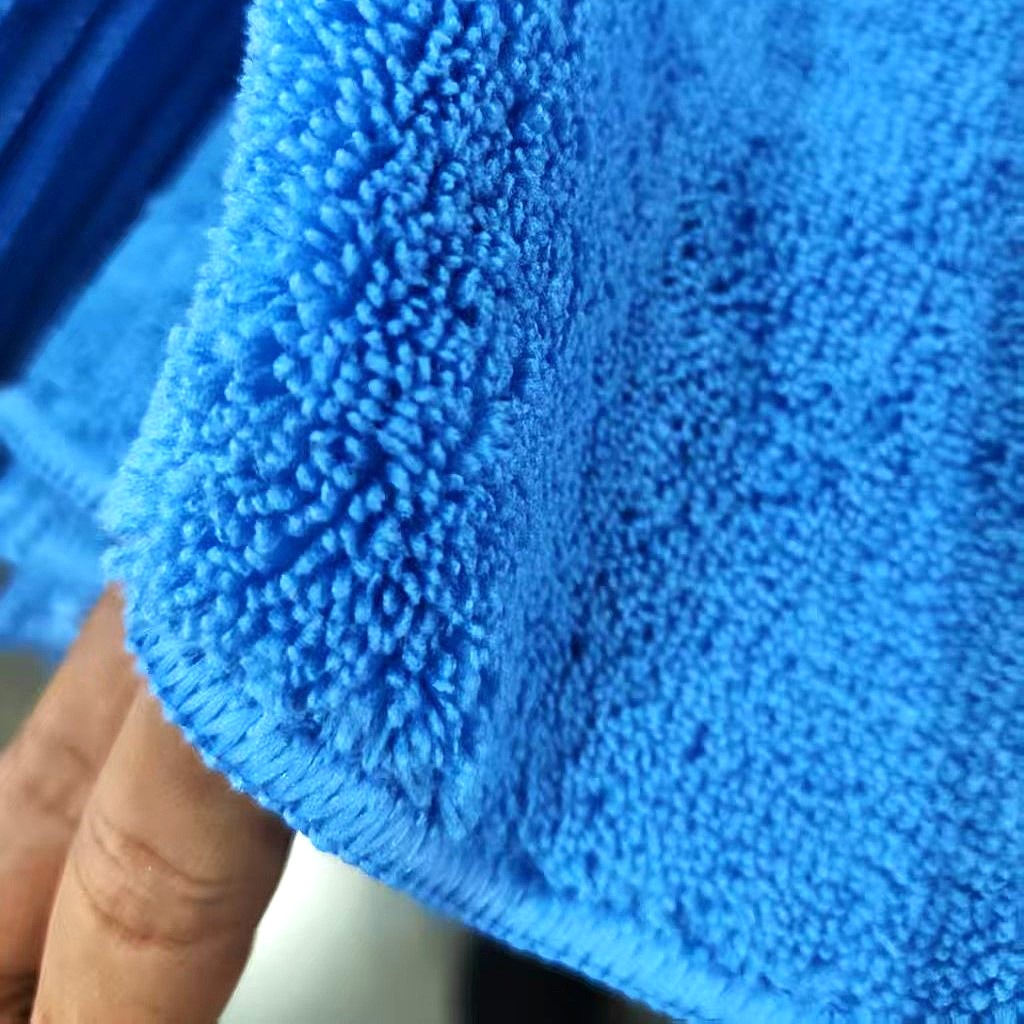 Close-up shot showing the two different textures of a dual-pile towel