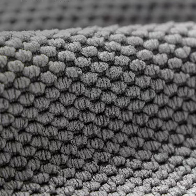 Textured Weave Cleaning Cloth Close-up of a microfiber cloth with a striped texture