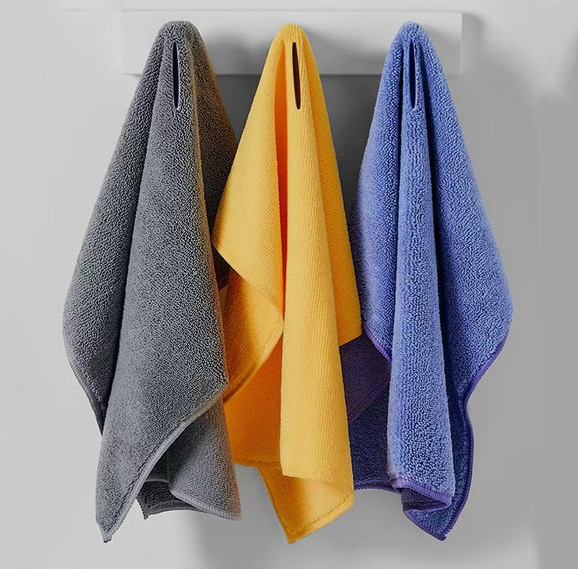 A stack of flat microfiber mop cloths for the Latin American market