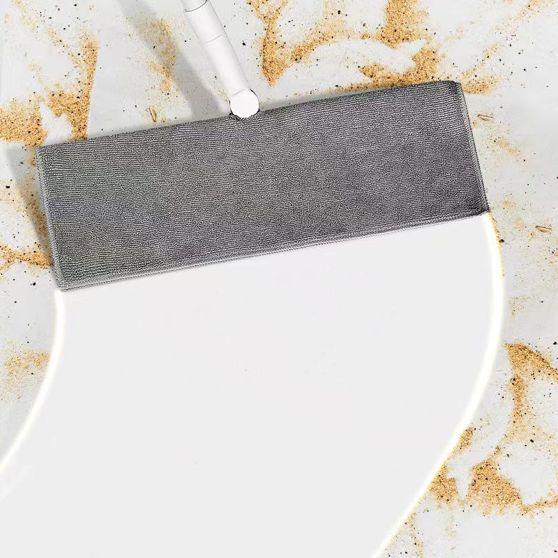 A large blue microfiber mop head on a white background