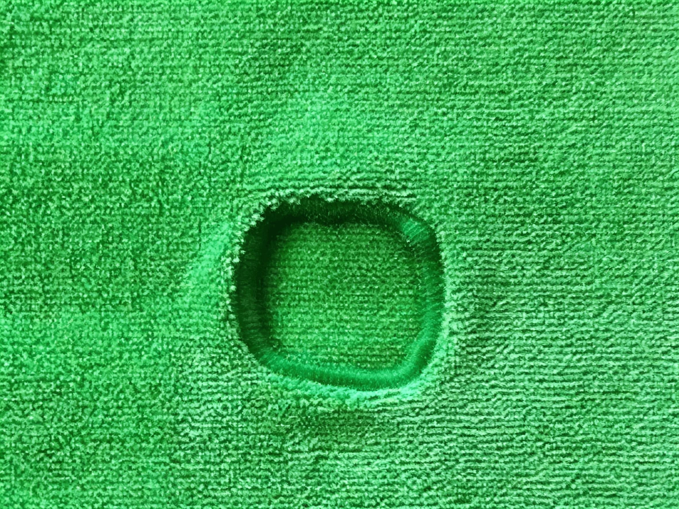 Close-up of different types of eyelets on a microfiber mop cloth