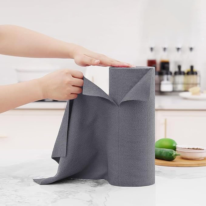 A roll of gray tear-away microfiber towels in a kitchen setting