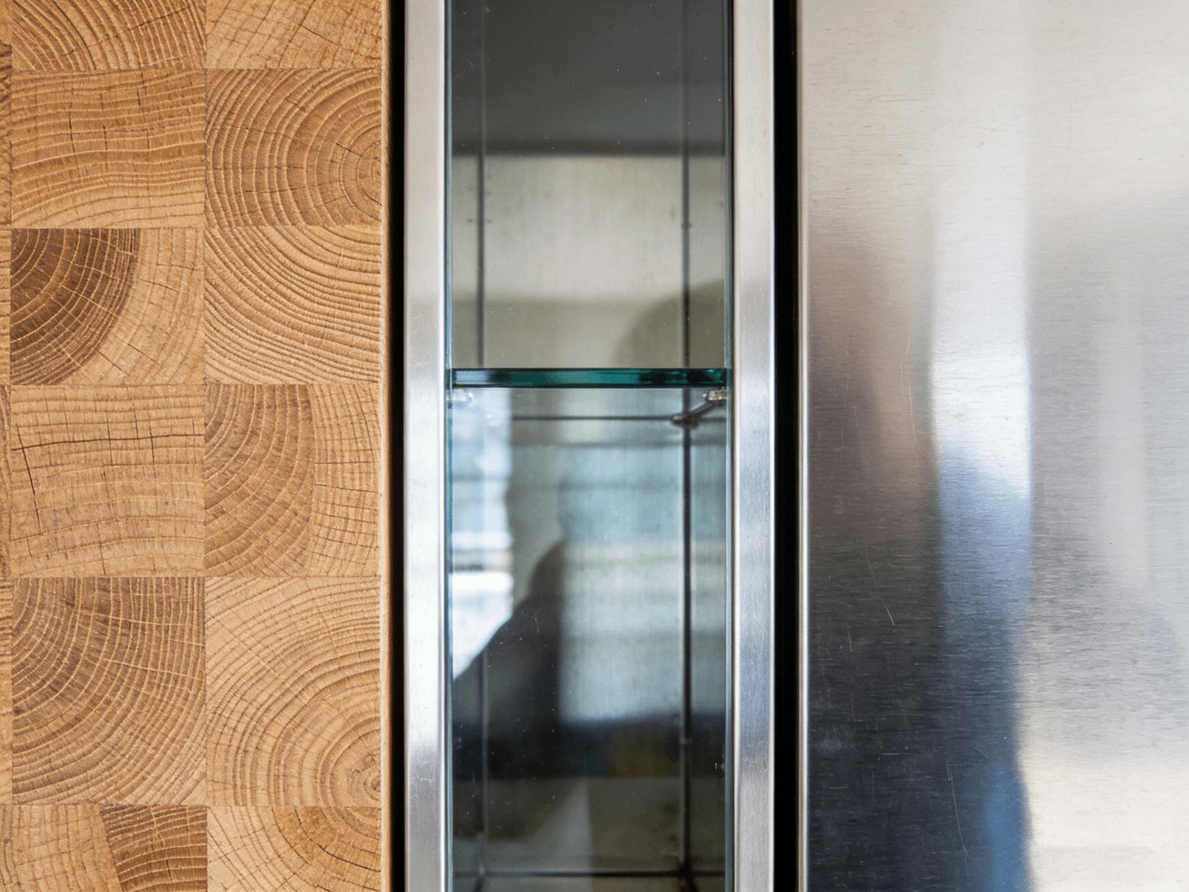 Multi-Purpose Microfiber Cleaning Cloth A person cleaning a glass surface with a microfiber cloth