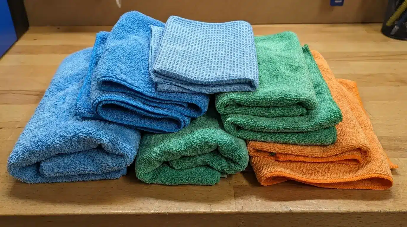 a collection of different types of microfiber car cleaning cloths