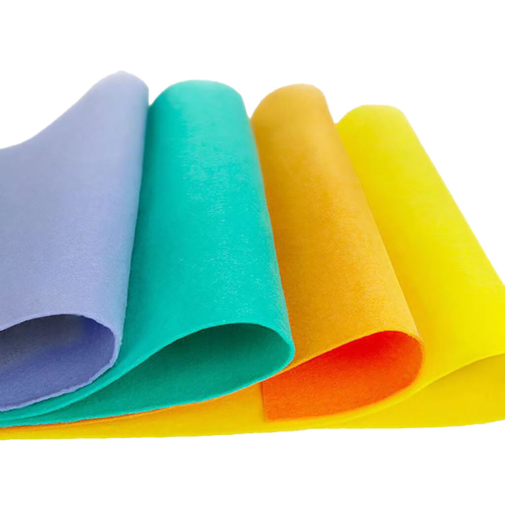 Colorful microfiber fabric rolls in purple, blue, green, yellow, and orange for bulk supply