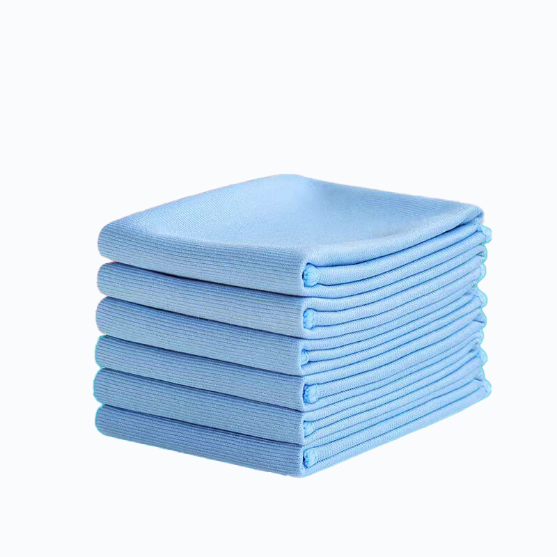 Neatly folded blue microfiber cloths suitable for glass and surface cleaning